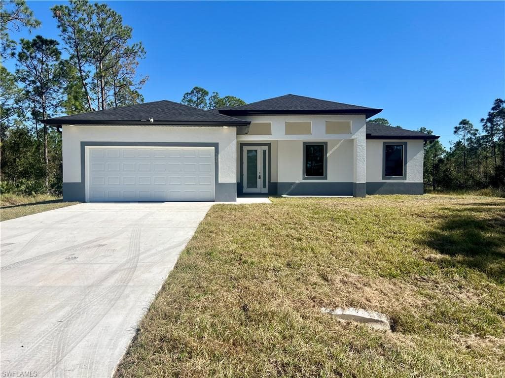 908 Columbus AVE LEHIGH ACRES, FL 33972