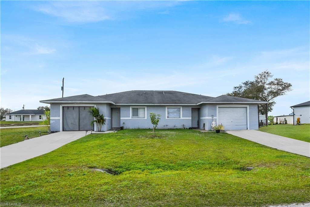 2401/2403 Xelda AVE N LEHIGH ACRES, FL 33971