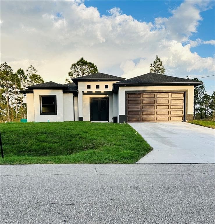 316 Moore AVE LEHIGH ACRES, FL 33936