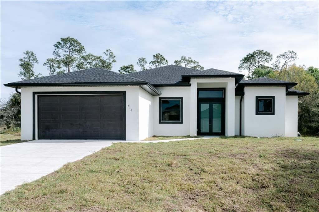 716 Calvin AVE LEHIGH ACRES, FL 33972
