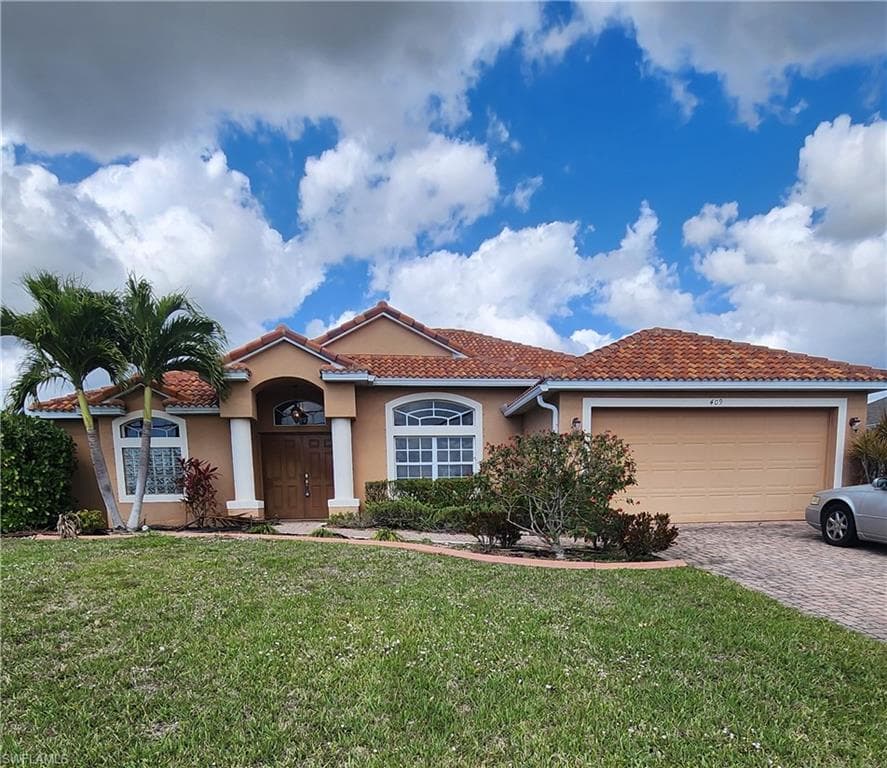 409 SW 8th ST CAPE CORAL, FL 33991