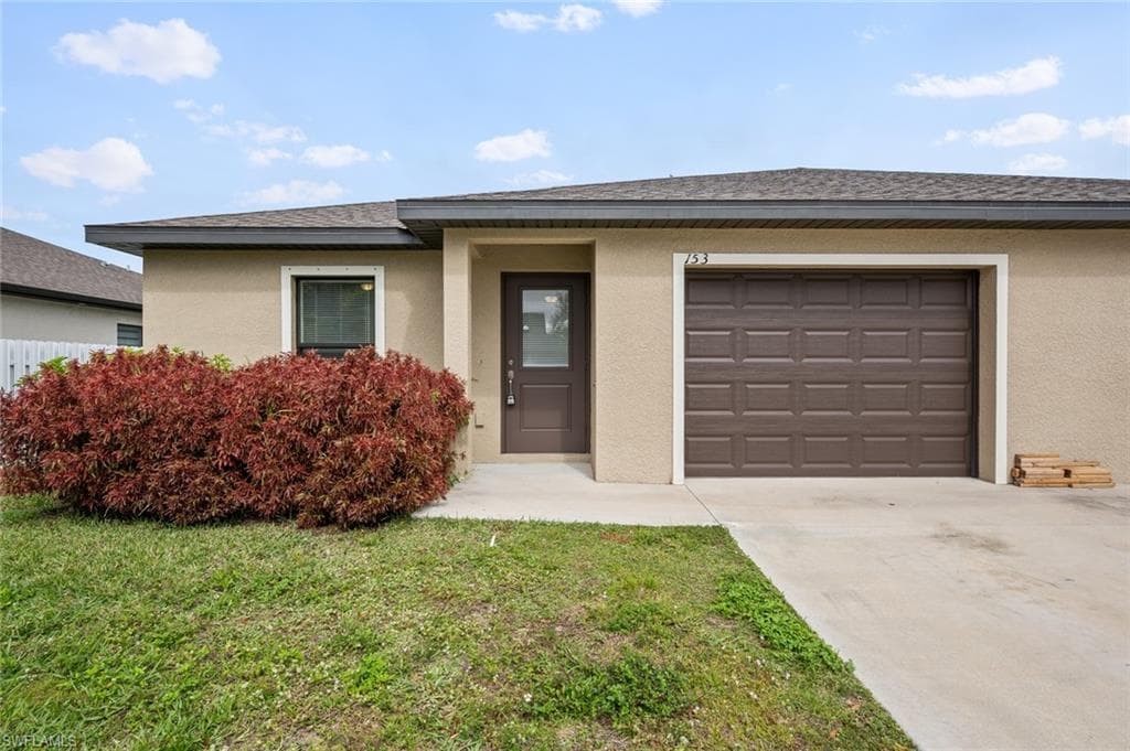 153 12th TER CAPE CORAL, FL 33990