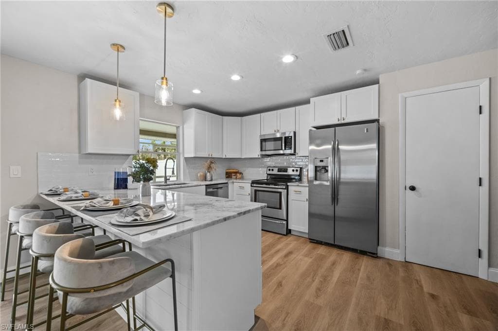 133 2nd AVE CAPE CORAL, FL 33990
