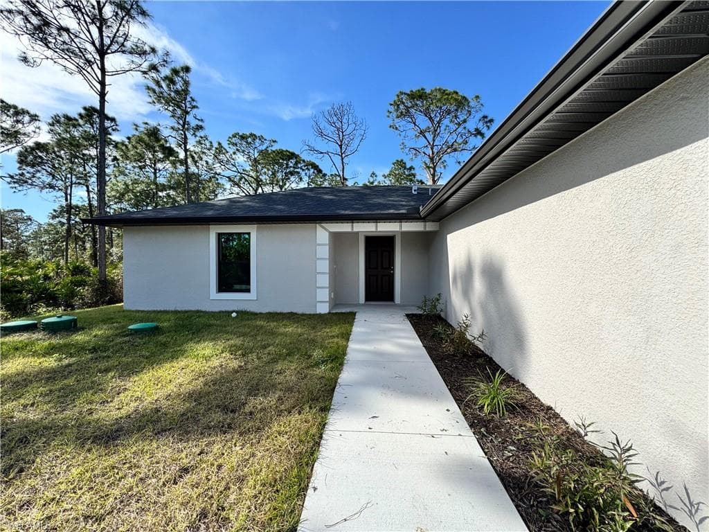 718 Bering AVE S LEHIGH ACRES, FL 33974
