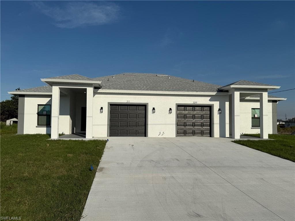 309-311 Homer AVE S LEHIGH ACRES, FL 33973