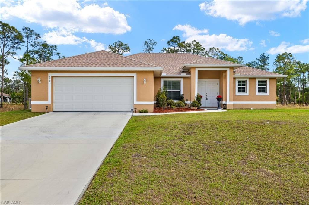 608 Truman AVE LEHIGH ACRES, FL 33972