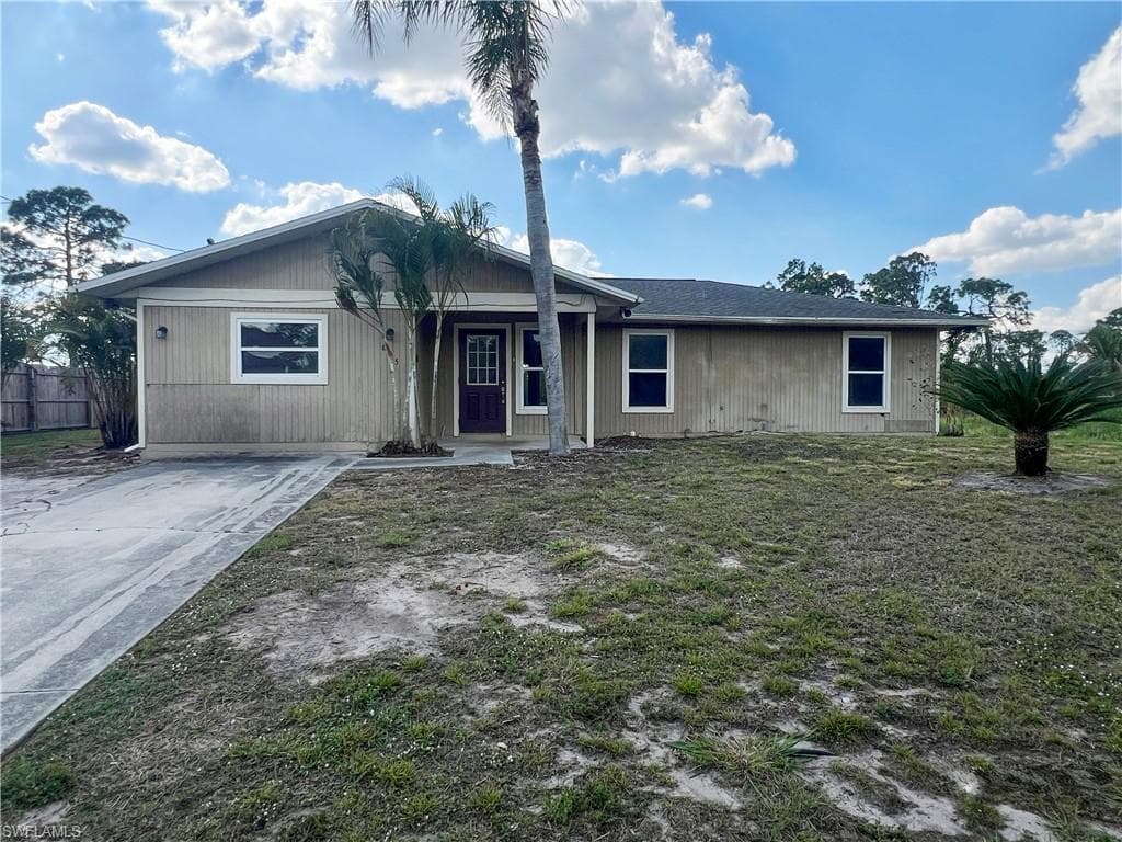 605 Leo AVE N LEHIGH ACRES, FL 33971