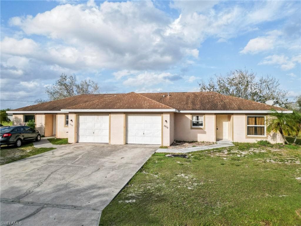 2408/2410 Crawford AVE N LEHIGH ACRES, FL 33971