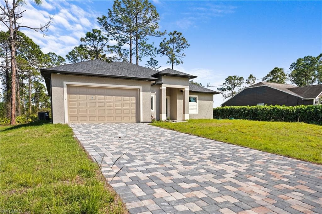 221 CORVET AVE LEHIGH ACRES, FL 33974