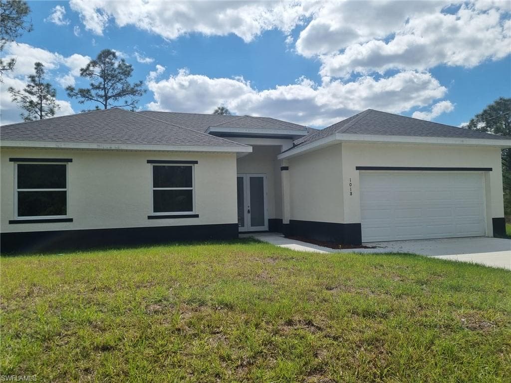 3418 66th St W LEHIGH ACRES, FL 33974