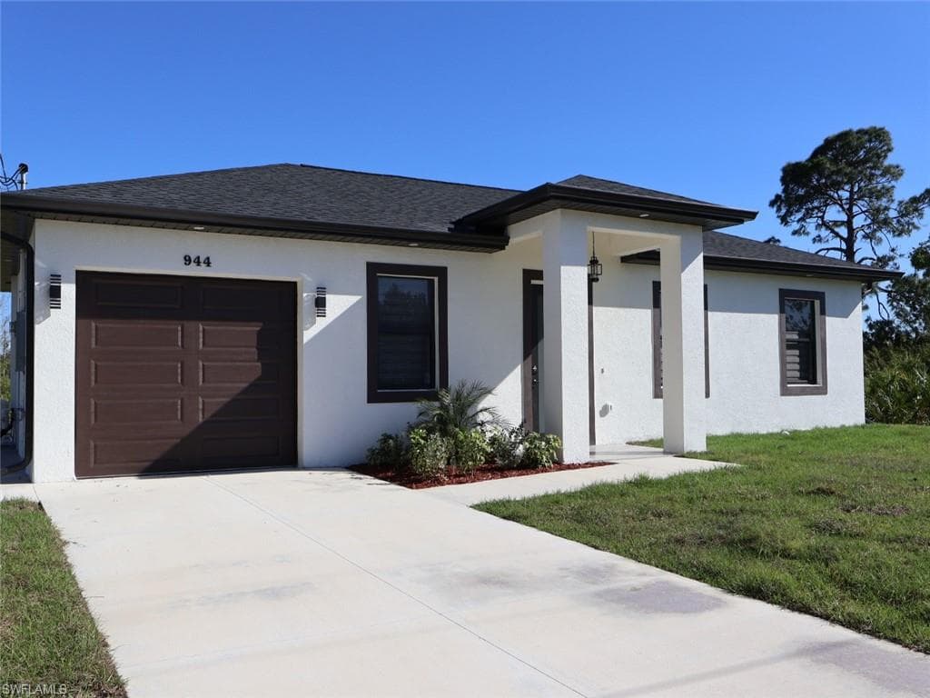 944 Grant BLVD LEHIGH ACRES, FL 33974