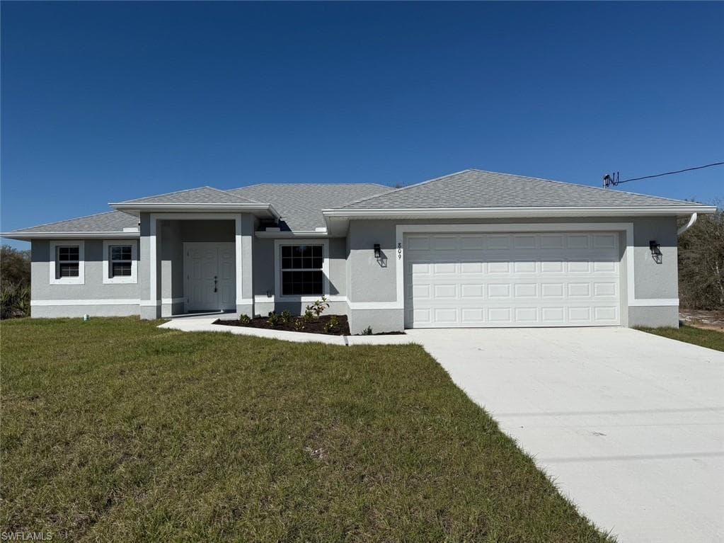 809 Poinsettia AVE LEHIGH ACRES, FL 33972