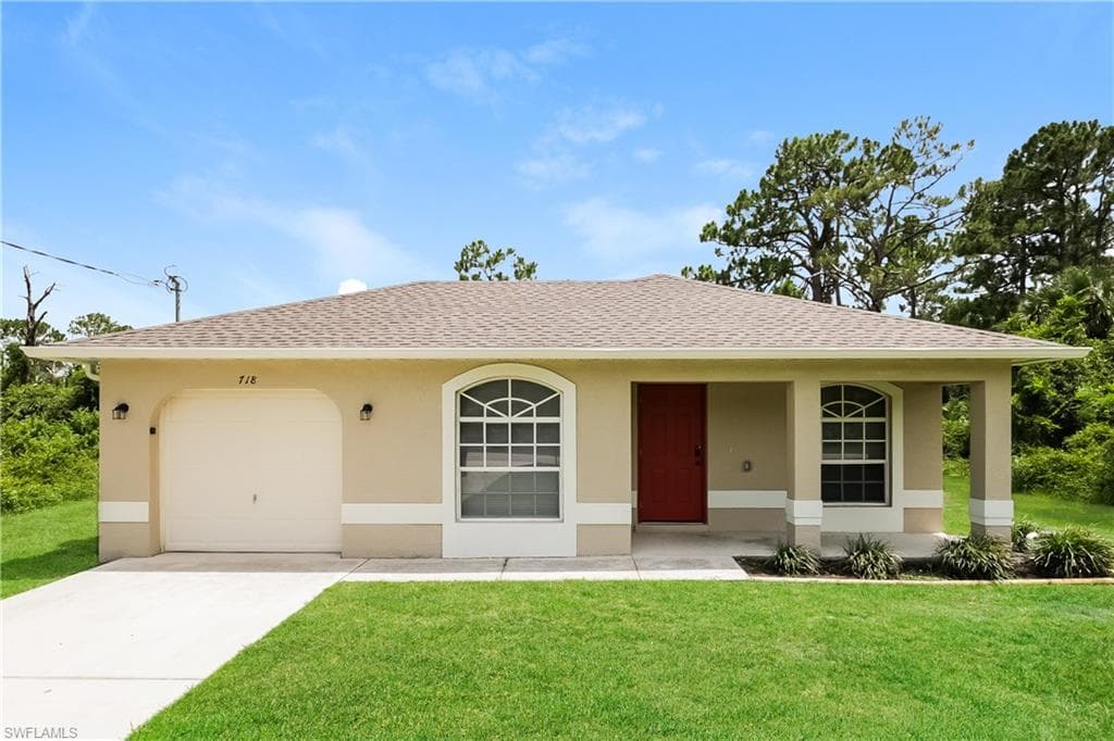 718 Sunrise BLVD LEHIGH ACRES, FL 33974