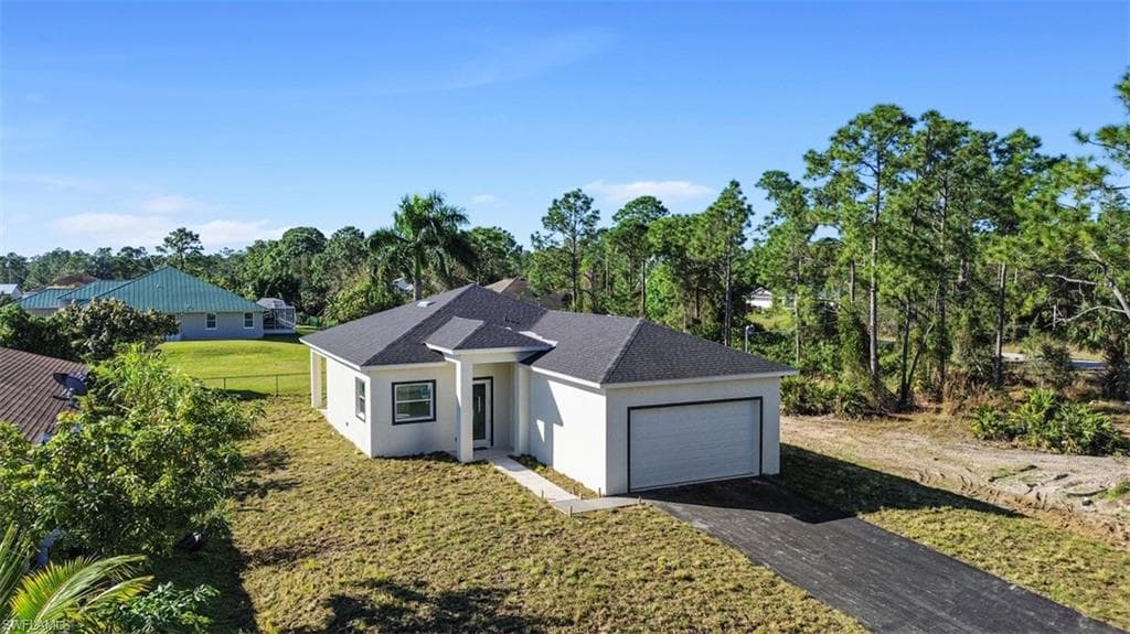 506 Trinity ST E LEHIGH ACRES, FL 33974