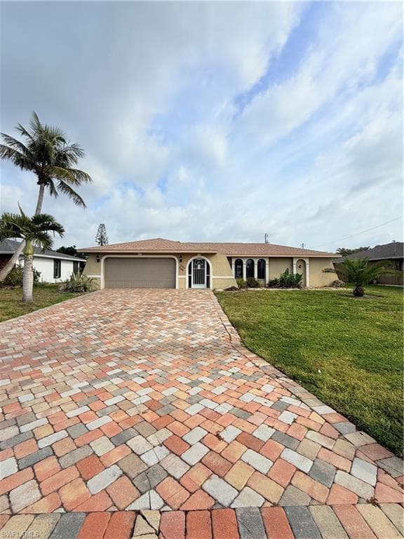 911 SE 34th TER CAPE CORAL, FL 33904