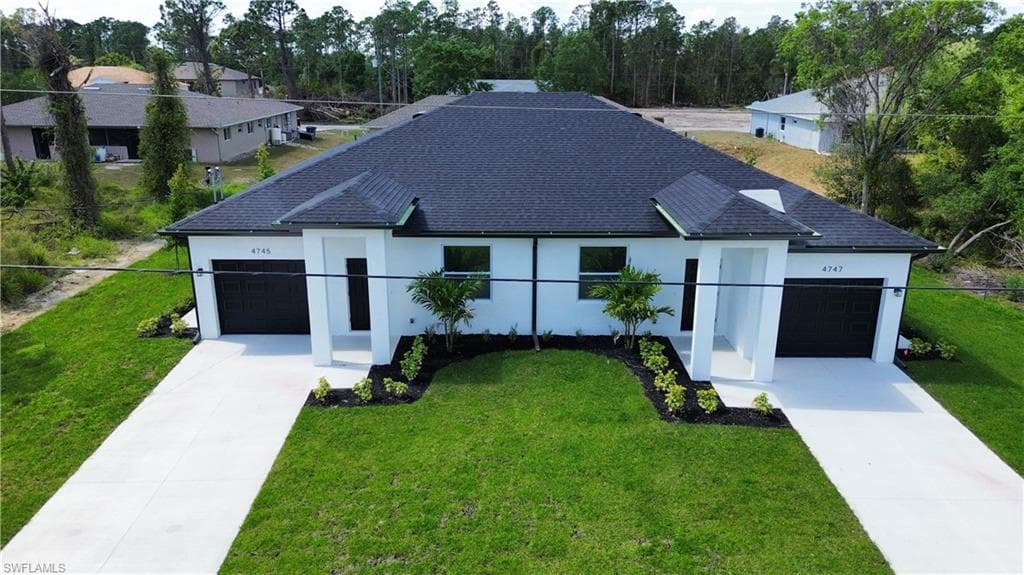 717 Ichabod AVE S LEHIGH ACRES, FL 33973