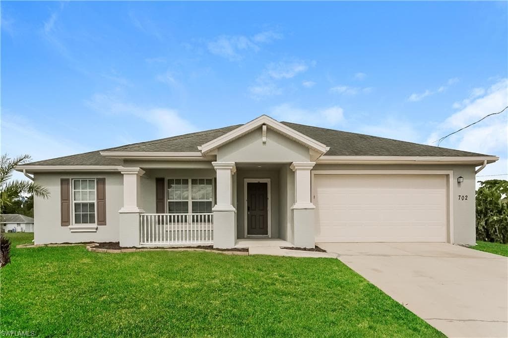 702 Yvonne AVE N LEHIGH ACRES, FL 33971