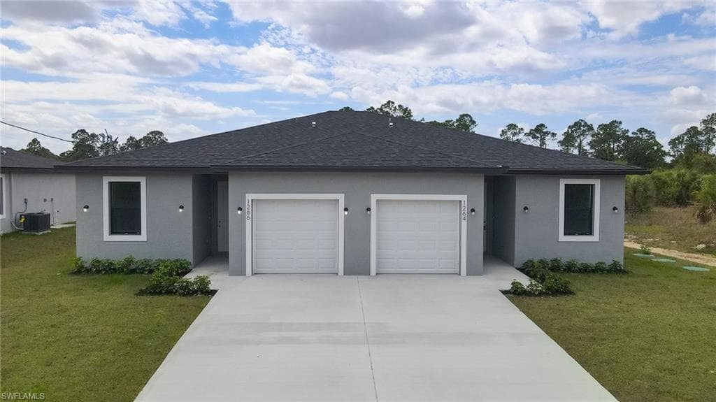 1264 MILWAUKEE BLVD 1264 LEHIGH ACRES, FL 33974