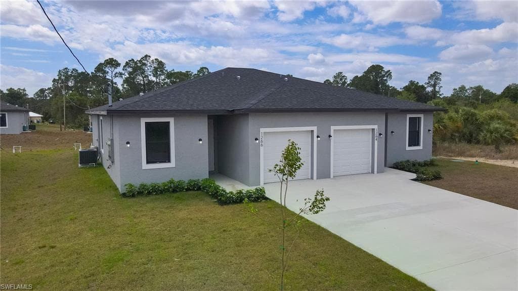 1266 MILWAUKEE BLVD 1266 LEHIGH ACRES, FL 33974