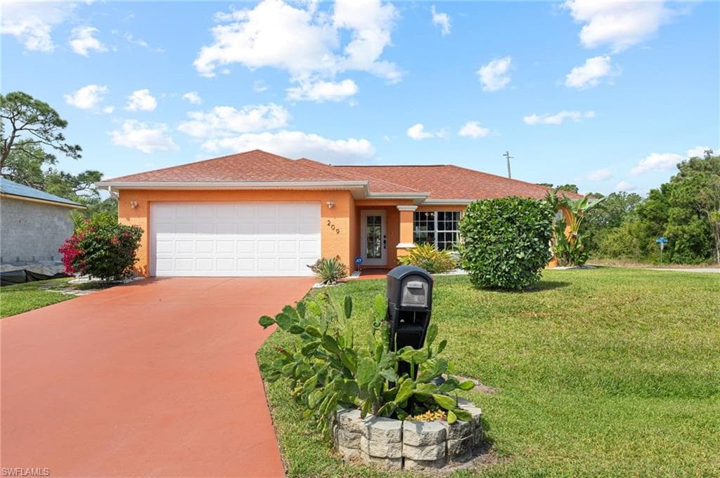 209 Gerald AVE N LEHIGH ACRES, FL 33971