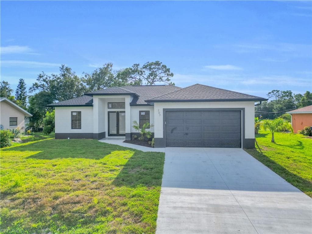 207 Gerald AVE N LEHIGH ACRES, FL 33971