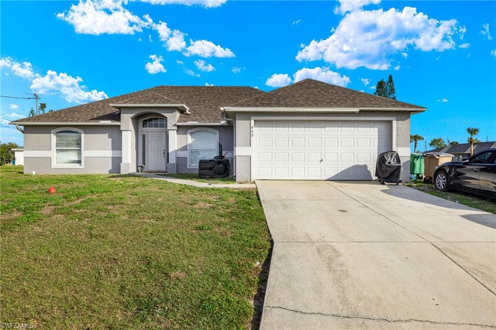 409 NE 25th TER CAPE CORAL, FL 33909