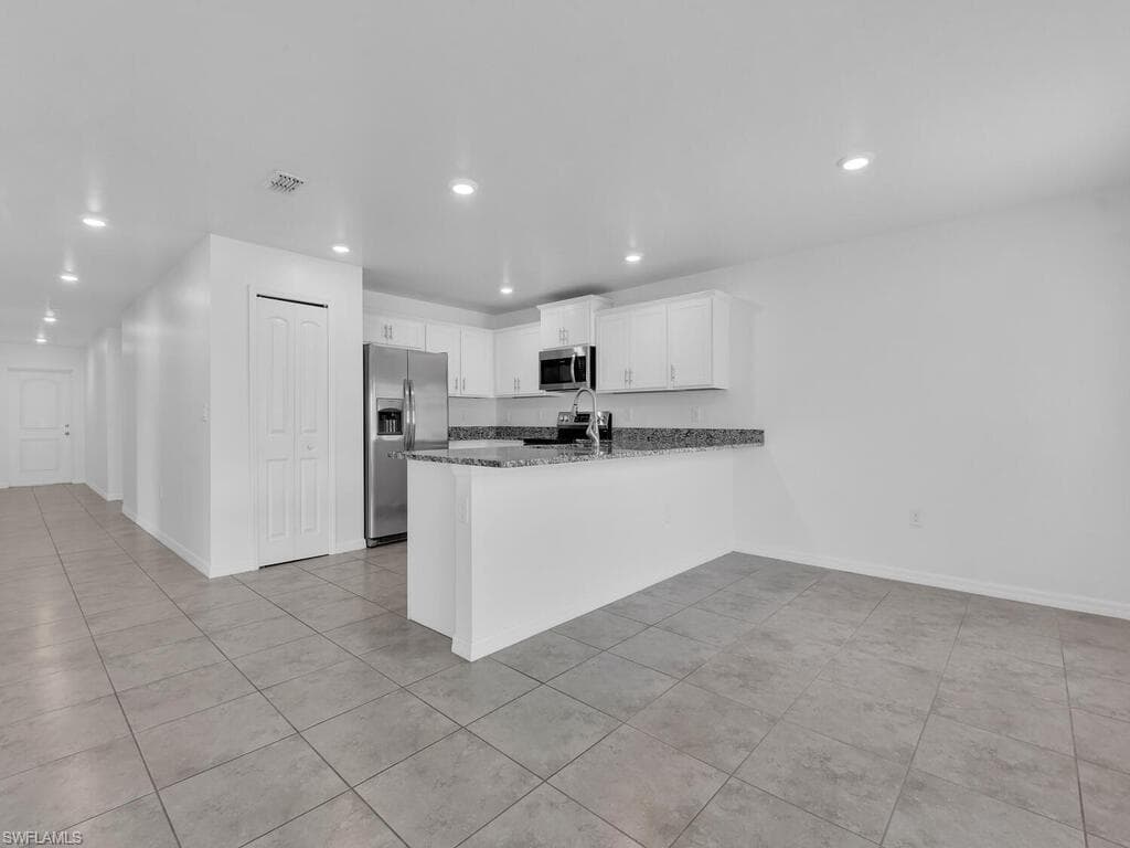 1512 NW 31st AVE CAPE CORAL, FL 33993
