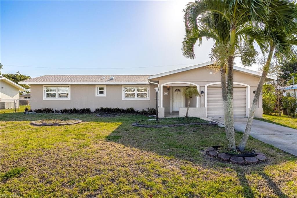409 NE 13th AVE CAPE CORAL, FL 33909