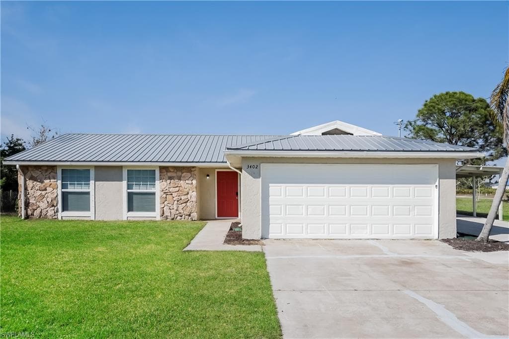 3402 12th ST SW LEHIGH ACRES, FL 33976
