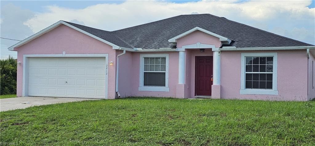 2812 62ND ST W LEHIGH ACRES, FL 33971