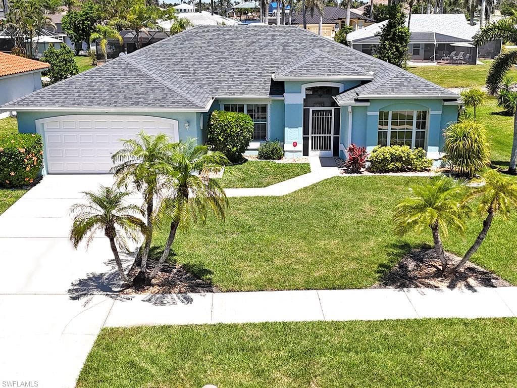 1037 Rose Garden RD CAPE CORAL, FL 33914