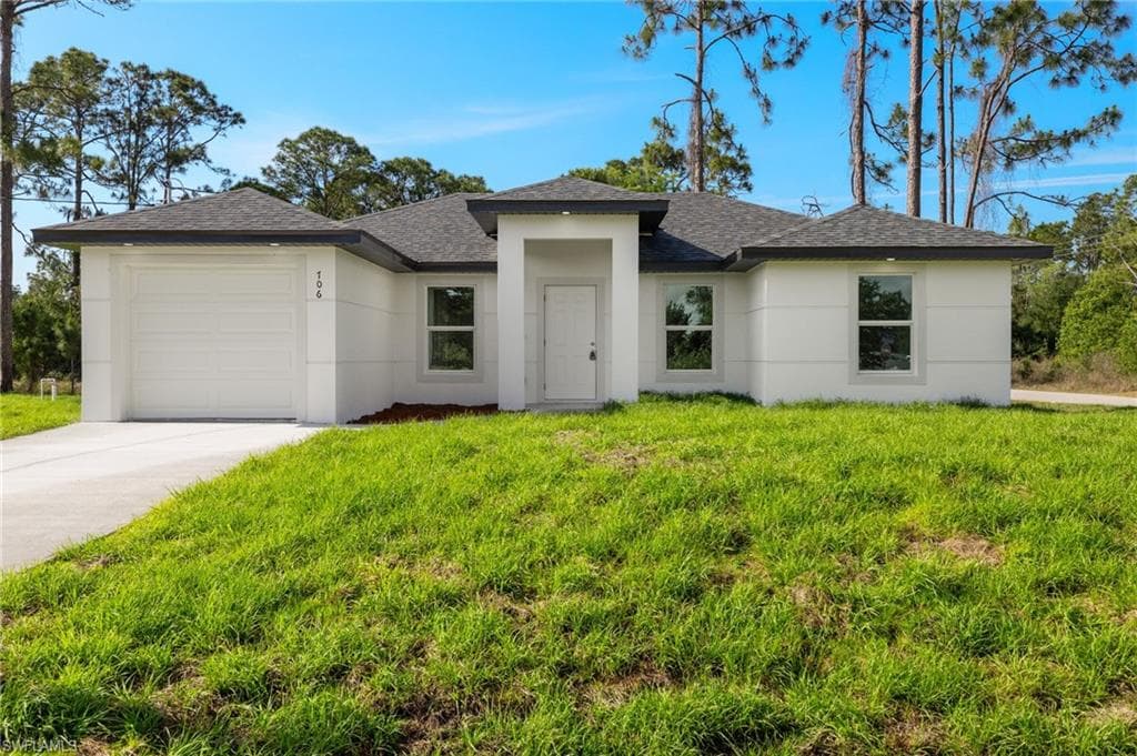 706 Lamar ST E LEHIGH ACRES, FL 33974