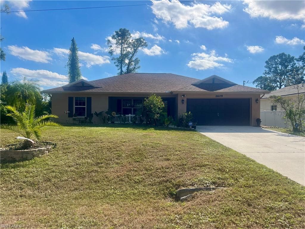 2609 11th ST W LEHIGH ACRES, FL 33971