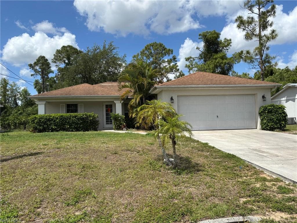 1203 Flora AVE N LEHIGH ACRES, FL 33971