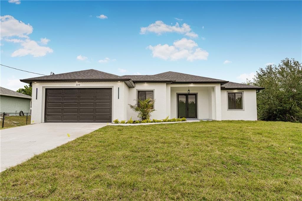 309 Peerless ST LEHIGH ACRES, FL 33974