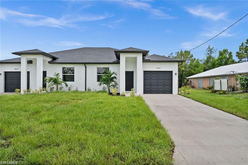 719 Ichabod AVE S LEHIGH ACRES, FL 33973