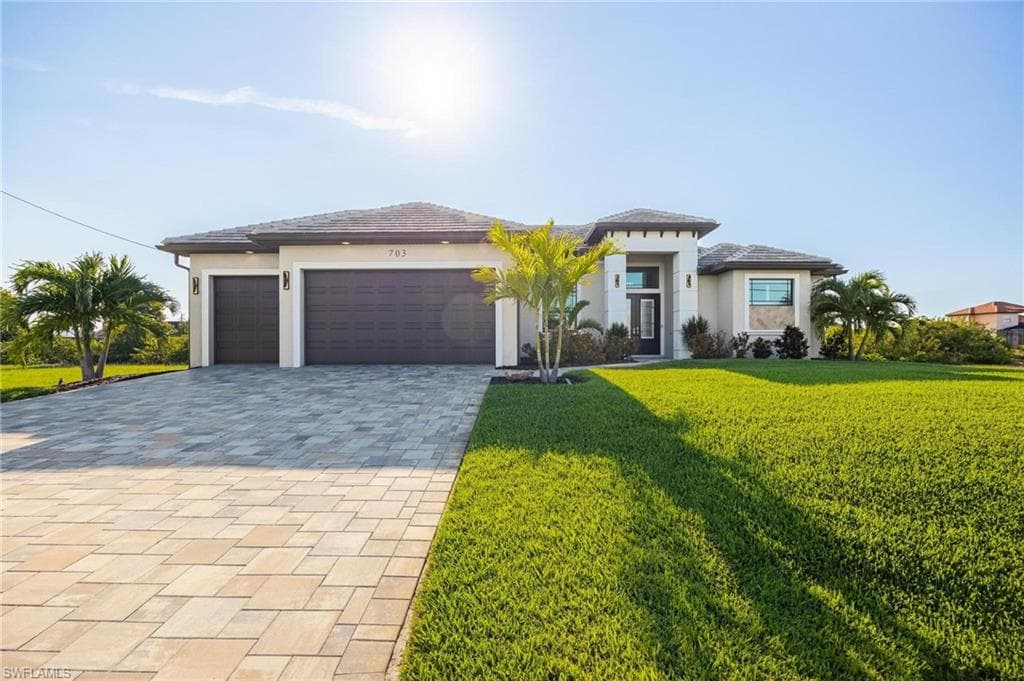 703 NW 36th PL CAPE CORAL, FL 33993