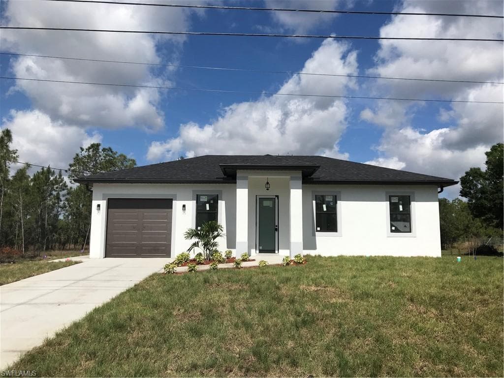 919 Glenn AVE LEHIGH ACRES, FL 33972