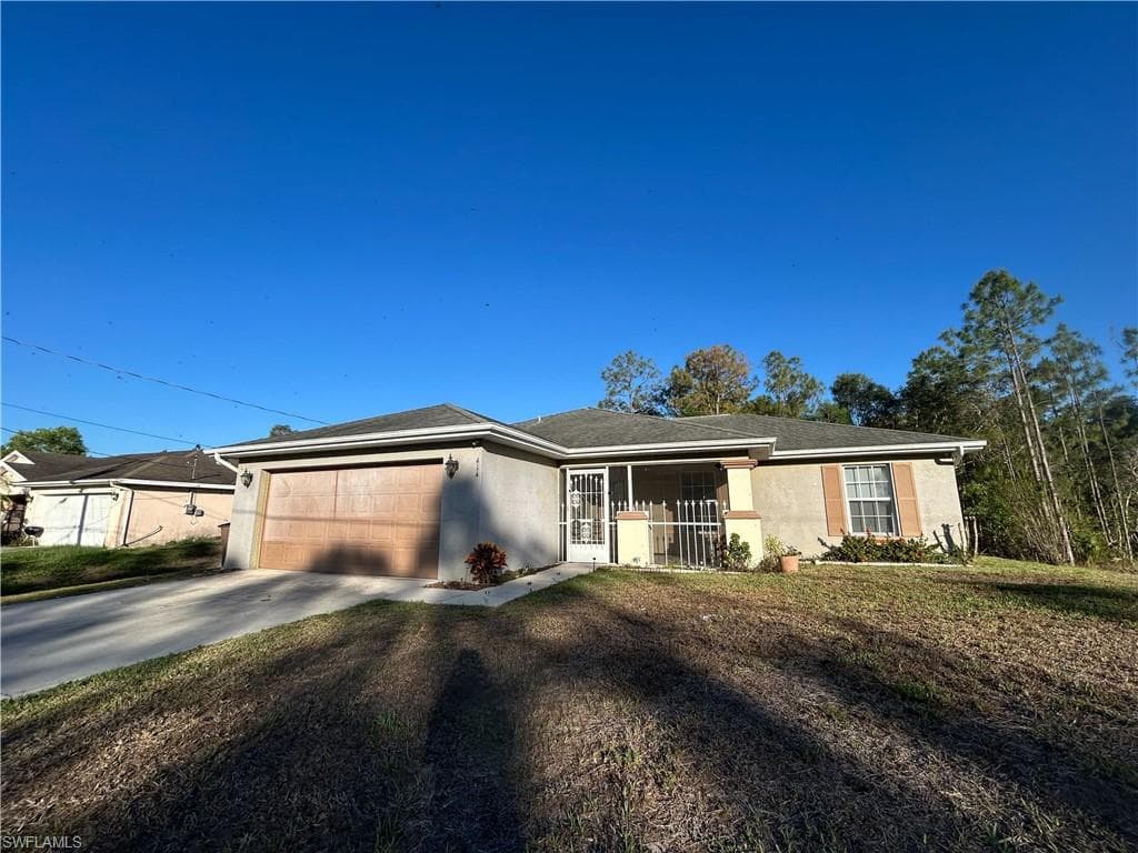 414 Jaguar BLVD LEHIGH ACRES, FL 33974