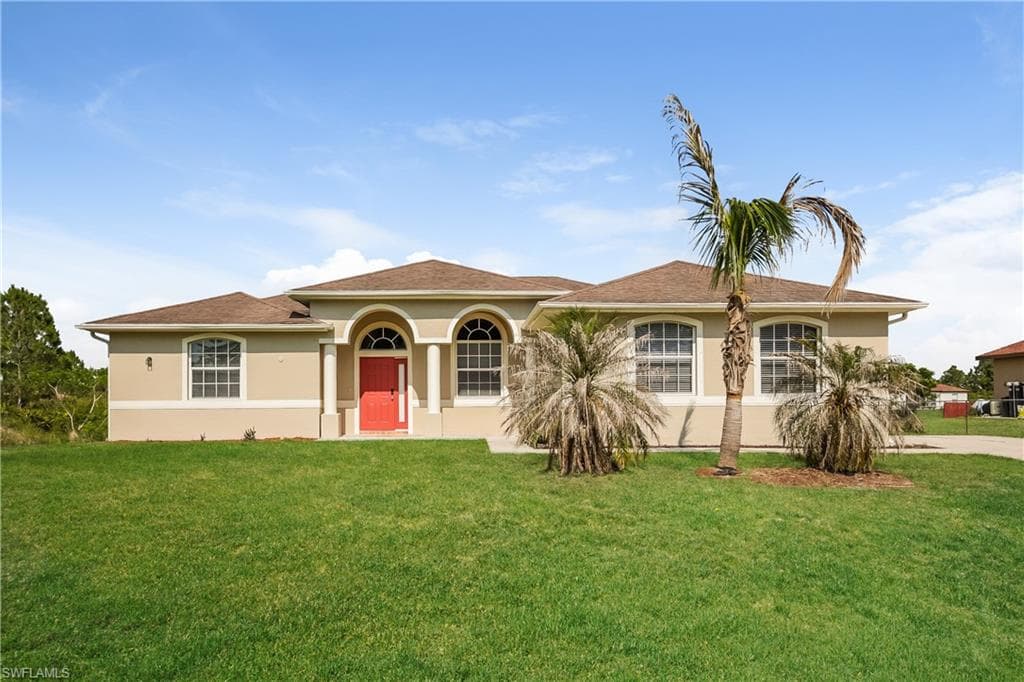 906 Cortez AVE LEHIGH ACRES, FL 33972