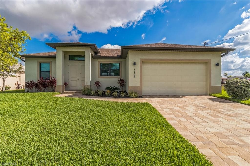 1209 SE 14th ST CAPE CORAL, FL 33990