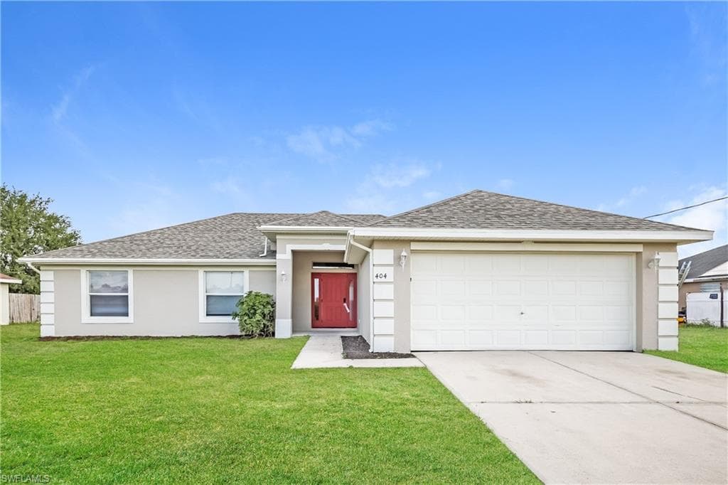 404 Willowbrook DR LEHIGH ACRES, FL 33972
