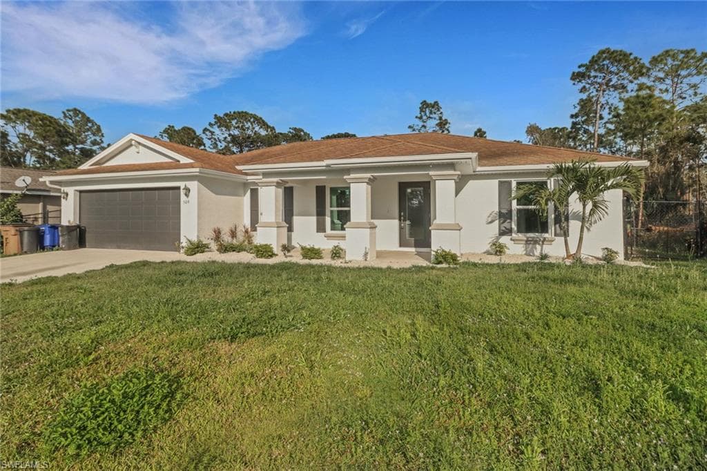 506 Hutton ST E LEHIGH ACRES, FL 33974