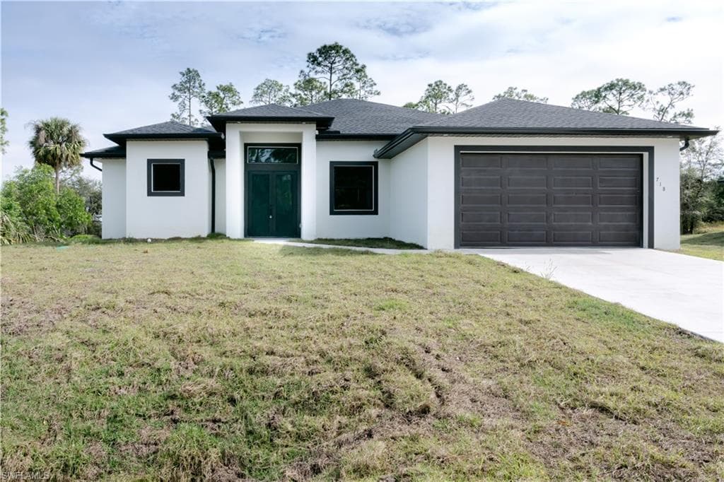 718 Calvin AVE LEHIGH ACRES, FL 33972