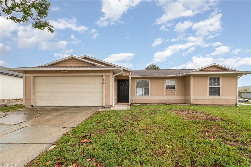 302 NE 10th TER CAPE CORAL, FL 33909