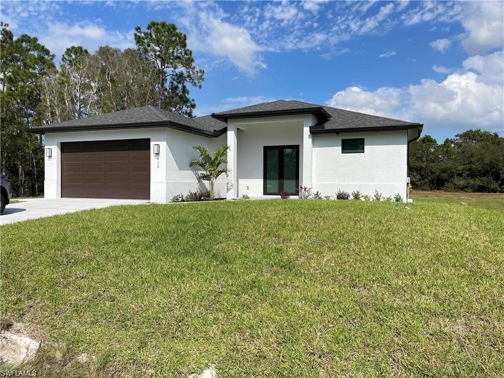 615 Addison ST E LEHIGH ACRES, FL 33974