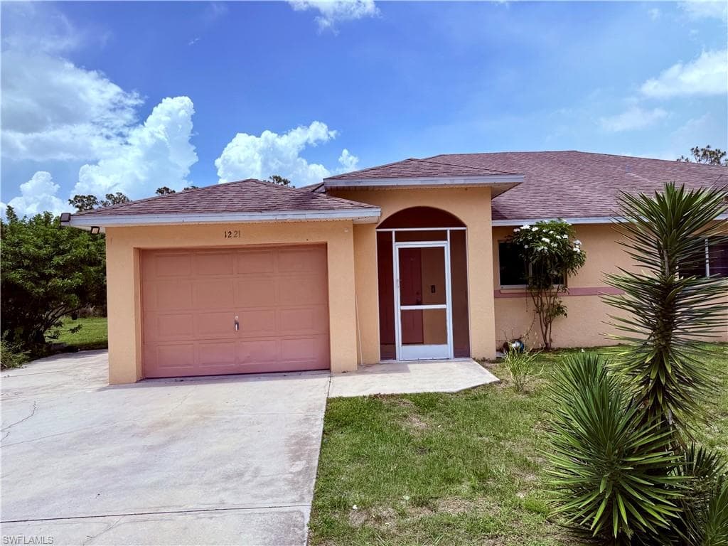 1221 E 12th ST LEHIGH ACRES, FL 33972
