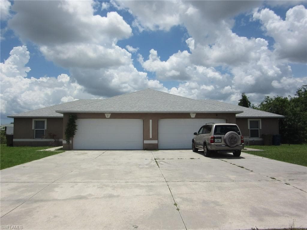 1568/1570 Gilbert AVE S LEHIGH ACRES, FL 33973