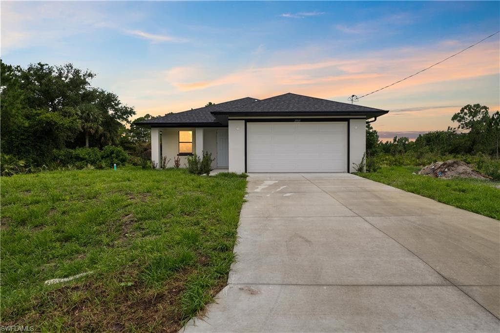 2703 54th ST W LEHIGH ACRES, FL 33971