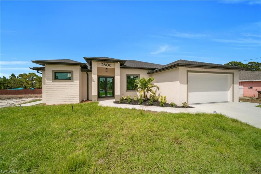 2606 34th ST SW LEHIGH ACRES, FL 33976